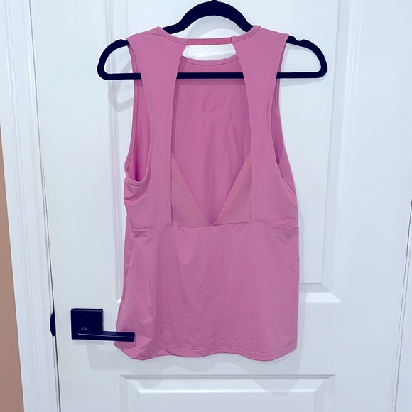 NWOT Nike Pro Women’s Tank Top. Pink/Fuchsia. Dri-Fit. Cut out back. Size small. - Picture 2 of 4